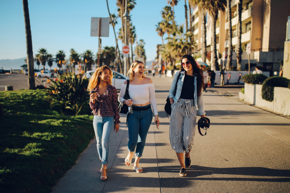 Walking along Venice Beach boardwalk