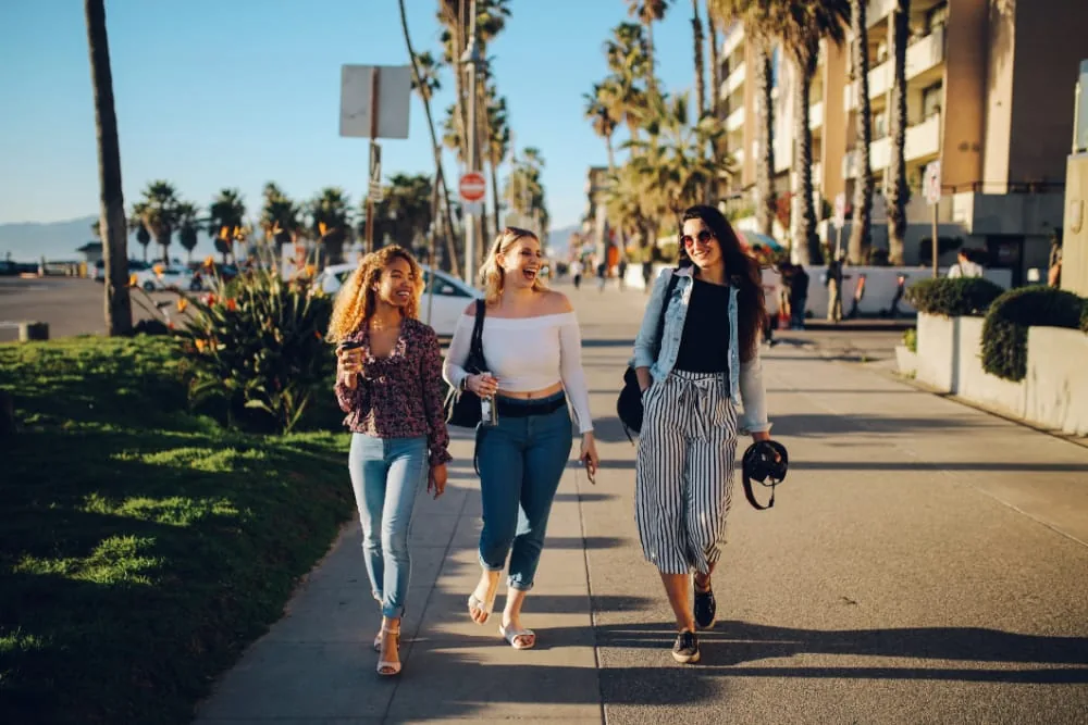 Walking along Venice Beach boardwalk